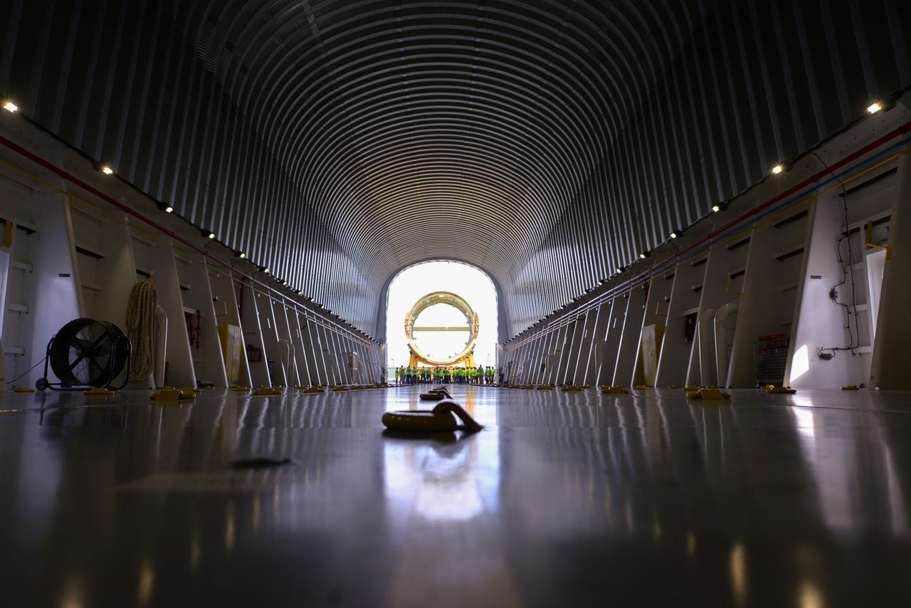 The S3 Move Crew holds a team tag up prior to loading the Intertank STA on the Pegasus Barge.